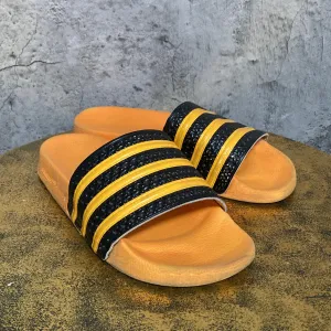 adilette by adidas orange black