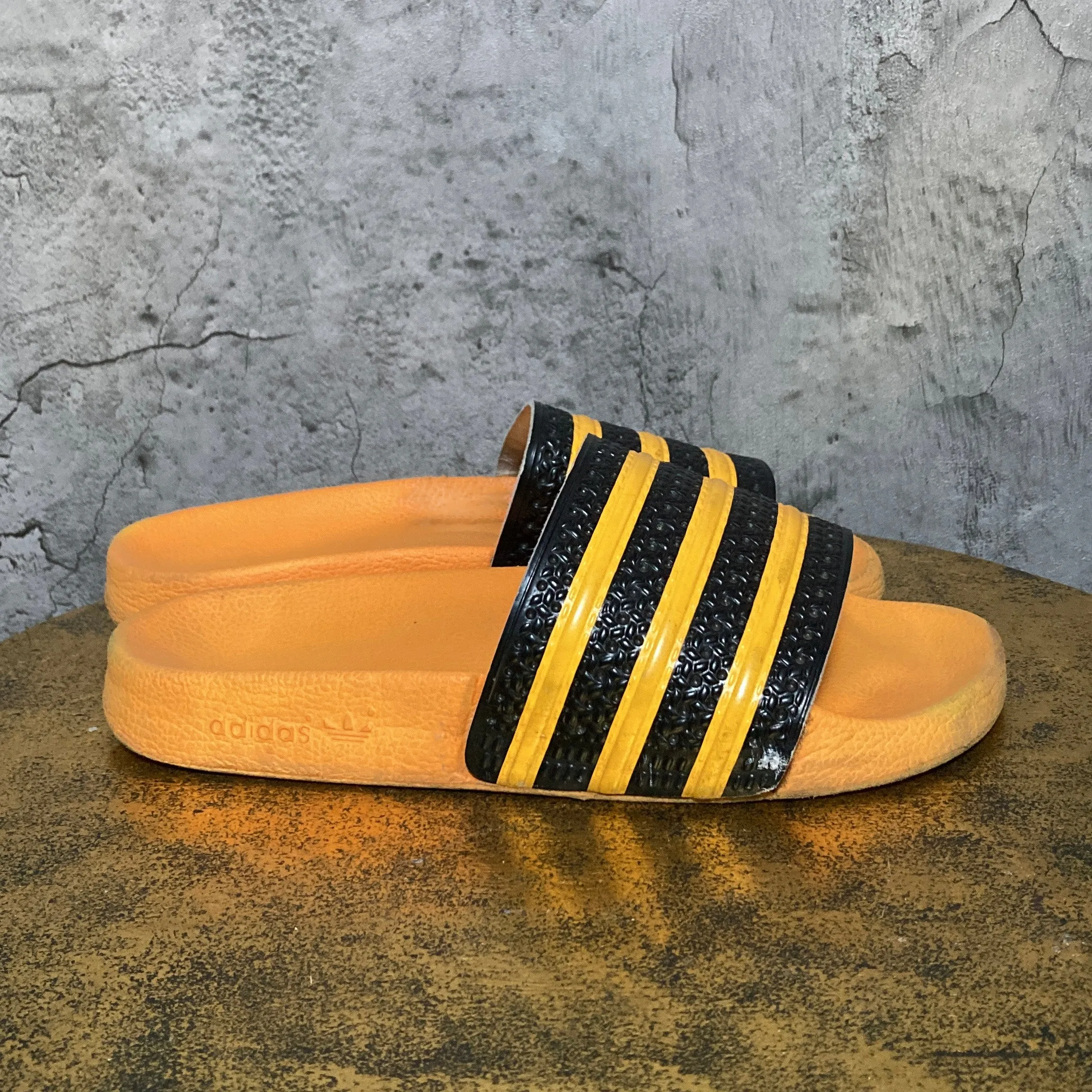 adilette by adidas orange black
