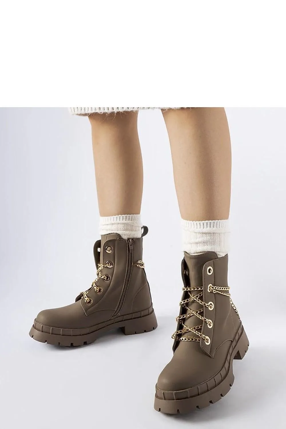Brown ankle boots with a chain