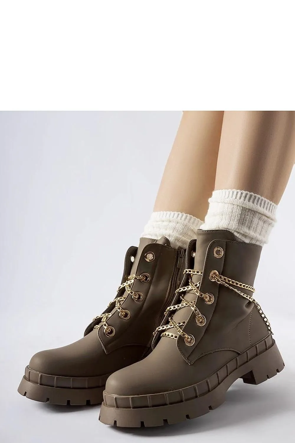 Brown ankle boots with a chain
